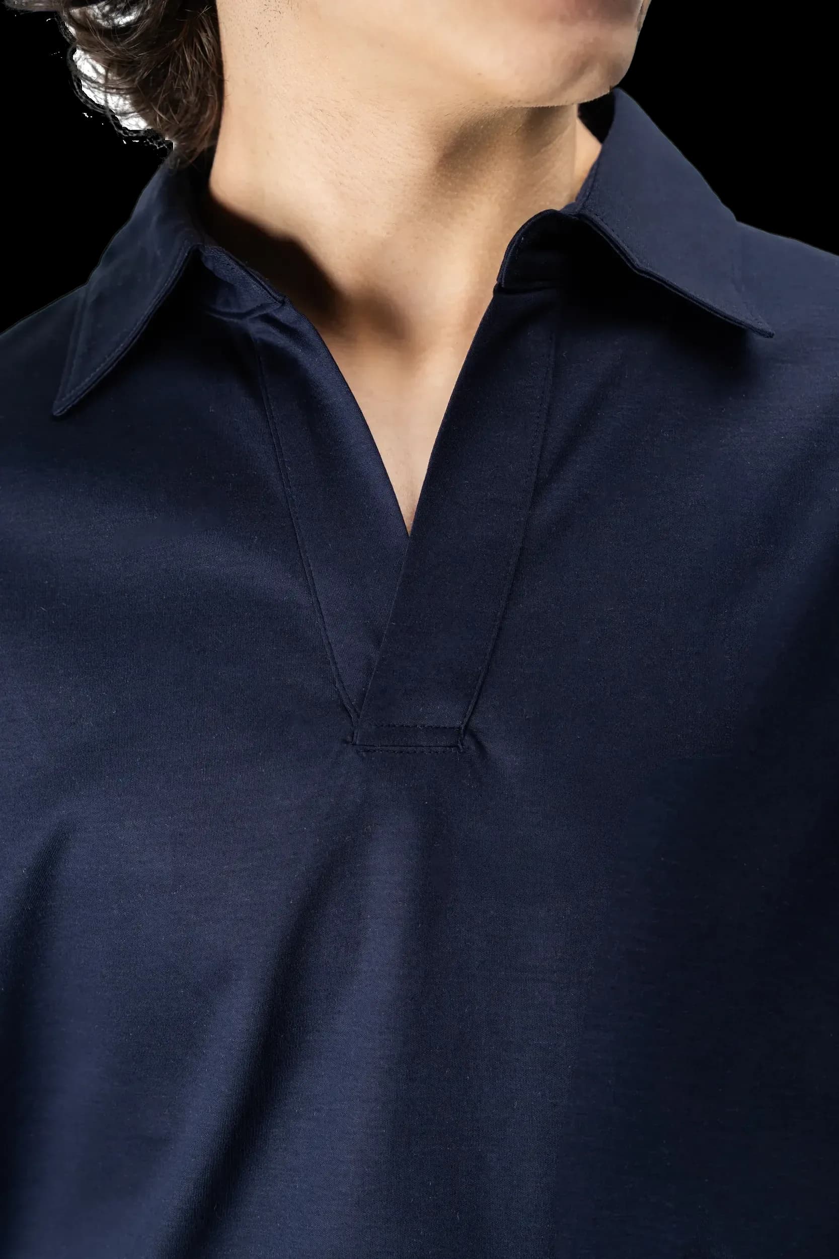 Navy polo collar, close